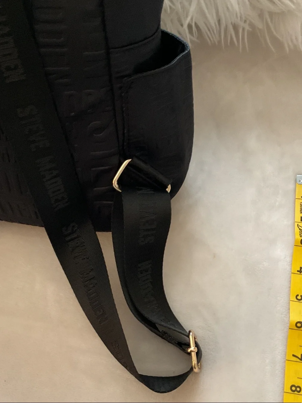 Steve Madden Black Embossed Logo Backpack with Gold Zipper